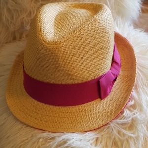 Womans Fedora with pink trim.